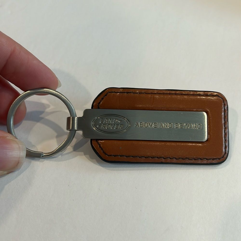 NWOT Land Rover Above And Beyond Silver Leather Key Chain